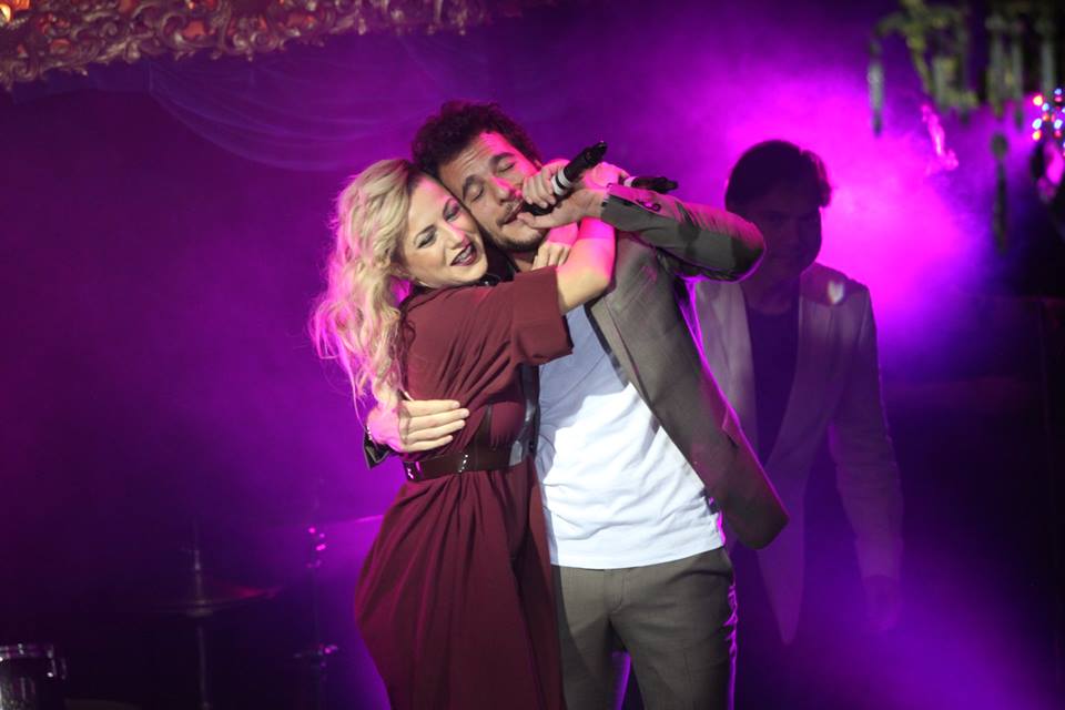 Poli and Amir sing together in London